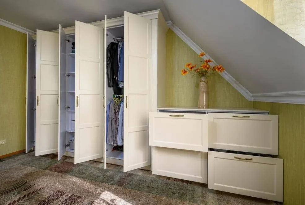 Built-in wardrobes in the apartment loft